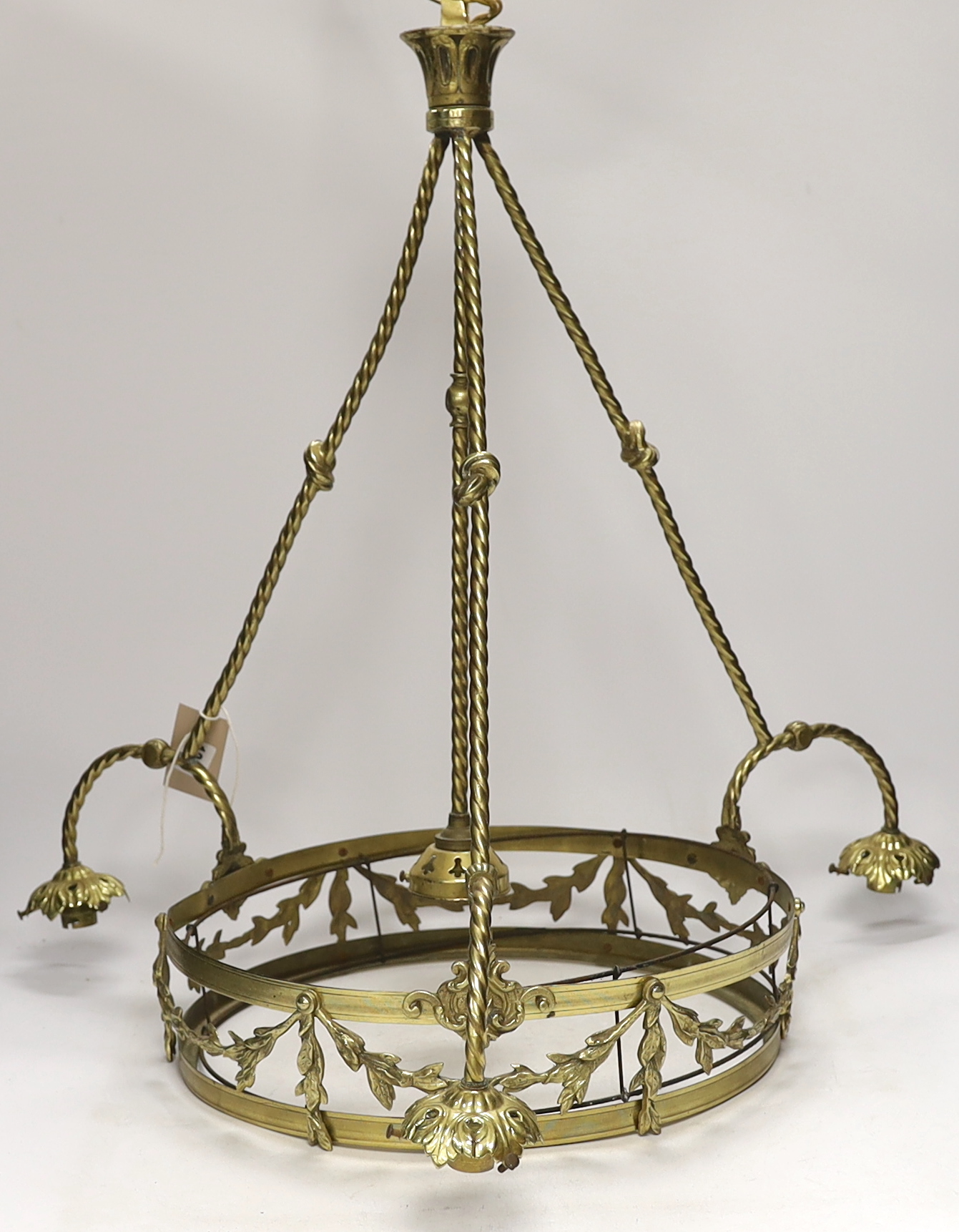 A brass three branch (four light) electrolier and four etched glass shades, 64cm high